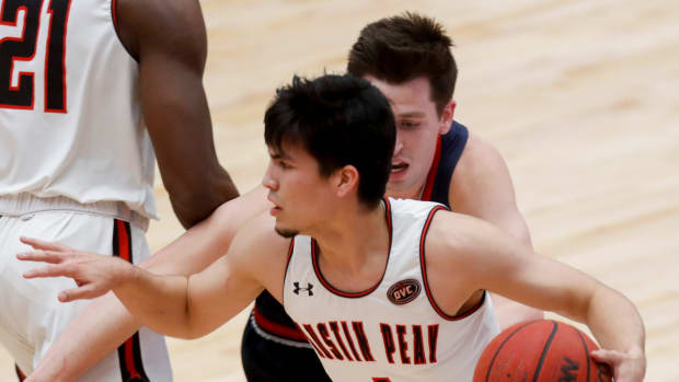 Austin Peay's Carlos Paez (1) navigates down the court in an OVC conference basketball game between the Austin Peay Governors and Belmont Bruins at APSU's Winfield Dunn Center in Clarksville, Tenn., on Thursday, Jan. 28, 2021.